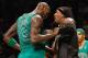 NEW YORK, NY - DECEMBER 25: Kevin Garnett #5 of the Boston Celtics and Gerald Wallace #45 of the Brooklyn Nets get tangled up and exchange words at the Barclays Center on December 25, 2012 in the Brooklyn borough of New York City. NOTE TO USER: User expressly acknowledges and agrees that, by downloading and/or using this photograph, user is consenting to the terms and conditions of the Getty Images License Agreement. Boston Celtics defeated the Brooklyn Nets 93-76. (Photo by Mike Stobe/Getty Images)