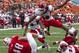 Dec 24, 2012; Honolulu, HI, USA; Southern Methodist Mustangs running back Zach Line (48) rolls under Fresno State Bulldogs strong safety Phillip Thomas (16) into the end zone for a touchdown during the second quarter of the Hawaii Bowl at Aloha Stadium. Mandatory Credit: Marco Garcia-USA TODAY Sports