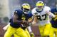 April 14, 2012; Ann Arbor, MI, USA; Michigan Wolverines quarterback Devin Gardner (7) runs the ball during the Michigan spring game at Michigan Stadium. Mandatory Credit: Rick Osentoski-USA TODAY Sports