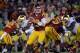 LOS ANGELES, CA - NOVEMBER 24: Max Wittek #13 of the USC Trojans looks to pass during a 22-13 loss to the Notre Dame Fighting Irish at Los Angeles Memorial Coliseum on November 24, 2012 in Los Angeles, California. (Photo by Harry How/Getty Images)