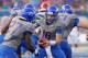BOISE, ID - OCTOBER 13: Joe Southwick #16 of the Boise State Broncos hands off the ball to Jay Ajayi #27 during the game against the Fresno State Bulldogs at Bronco Stadium on October 13, 2012 in Boise, Idaho. (Photo by Otto Kitsinger III/Getty Images)