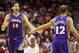 Apr 9, 2013; Houston, TX, USA; Phoenix Suns power forward Luis Scola (14) is congratulated by Kendall Marshall (12) after a play during the fourth quarter against the Houston Rockets at Toyota Center. Mandatory Credit: Troy Taormina-USA TODAY Sports