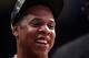 HOUSTON, TX - FEBRUARY 17: Rapper Jay-Z smiles before the 2013 NBA All-Star game at the Toyota Center on February 17, 2013 in Houston, Texas. NOTE TO USER: User expressly acknowledges and agrees that, by downloading and or using this photograph, User is consenting to the terms and conditions of the Getty Images License Agreement. (Photo by Ronald Martinez/Getty Images)
