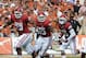 Sep 13, 2012; Dallas, TX, USA; Oklahoma Sooner running back Damien Williams (26) runs with the ball with blocking by tackle Darryl Williams (79) and fullback Trey Millard (33) against the Texas Longhorns during the red river rivalry at the Cotton Bowl. Mandatory Credit: Matthew Emmons-USA TODAY Sports