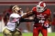 RALEIGH, NC - OCTOBER 06: Cornellius Carradine #91 of the Florida State Seminoles tackles Tony Creecy #26 of the North Carolina State Wolfpack during their game at Carter-Finley Stadium on October 6, 2012 in Raleigh, North Carolina. (Photo by Streeter Lecka/Getty Images)