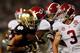 MIAMI GARDENS, FL - JANUARY 07: TJ Jones #7 of the Notre Dame Fighting Irish gets tackled by Ty Reed #13 of the Alabama Crimson Tide during the 2013 Discover BCS National Championship game at Sun Life Stadium on January 7, 2013 in Miami Gardens, Florida. (Photo by Kevin C. Cox/Getty Images)