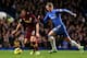 LONDON, ENGLAND - NOVEMBER 25: David Silva of Manchester City is pursued by Fernando Torres of Chelsea during the Barclays Premier League match between Chelsea and Manchester City at Stamford Bridge on November 25, 2012 in London, England. (Photo by Julian Finney/Getty Images)