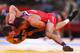 LONDON, ENGLAND - AUGUST 11: Coleman Scott of United States in action against Malkhaz Zarkua of Georgia in the Men's Freestyle Wrestling 60kg quarterfinal match on Day 15 of the London 2012 Olympic Games at ExCeL on August 11, 2012 in London, England. (Photo by Paul Gilham/Getty Images)