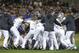 SAN DIEGO, CA - APRIL 11: San Diego Padres players and Los Angeles Dodgers players brawl after Carlos Quentin #18 charged Zack Greinke #21 of the Los Angeles Dodgers after being hit with a pitch during the sixth inning at Petco Park on April 11, 2013 in San Diego, California. Greinke would break his collarbone in the fight. (Photo by Denis Poroy/Getty Images)