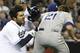 SAN DIEGO, CA - APRIL 11: Carlos Quentin #18 of the San Diego Padres slams into Zack Greinke #21 of the Los Angeles Dodgers as he charges the mound during the sixth inning at Petco Park on April 11, 2013 in San Diego, California. Greinke would break his collarbone in the fight. (Photo by Denis Poroy/Getty Images)
