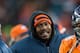 DENVER, CO - DECEMBER 30: Outside linebacker Von Miller #58 of the Denver Broncos smiles on the sideline as he stays warm in a large jacket in the fourth quarter of a game against the Kansas City Chiefs at Sports Authority Field at Mile High on December 30, 2012 in Denver, Colorado. The Broncos defeated the Chiefs 38-3. (Photo by Dustin Bradford/Getty Images)