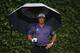 AUGUSTA, GA - APRIL 12: Phil Mickelson of the United States stands under an umbrella on the second tee during the second round of the 2013 Masters Tournament at Augusta National Golf Club on April 12, 2013 in Augusta, Georgia. (Photo by Andrew Redington/Getty Images)