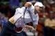 BOISE, ID - APRIL 05: John Isner serves to Novak Djokovic of Serbia during the first match of the Davis Cup tie between the United States and Serbia at Taco Bell Arena on April 5, 2013 in Boise, Idaho. (Photo by Matthew Stockman/Getty Images)