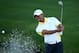 AUGUSTA, GA - APRIL 12: Tiger Woods of the United States hits out of the bunker on the 16th hole during the second round of the 2013 Masters Tournament at Augusta National Golf Club on April 12, 2013 in Augusta, Georgia. (Photo by Andrew Redington/Getty Images)
