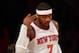 NEW YORK, NY - MARCH 31: Carmelo Anthony #7 of the New York Knicks celebrates his three point shot in the first quarter against the Boston Celtics on March 31, 2013 at Madison Square Garden in New York City. NOTE TO USER: User expressly acknowledges and agrees that, by downloading and/or using this photograph, user is consenting to the terms and conditions of the Getty Images License Agreement. (Photo by Elsa/Getty Images)