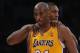 LOS ANGELES, CA - APRIL 12: Kobe Bryant #24 of the Los Angeles Lakers is consoled by Metta World Peace #15 of the Los Angeles Lakers after injuring himself against the Golden State Warriors in the second half at Staples Center on April 12, 2013 in Los Angeles, California. The Lakers defeated the Warriors 118-116. NOTE TO USER: User expressly acknowledges and agrees that, by downloading and or using this photograph, User is consenting to the terms and conditions of the Getty Images License Agreement. (Photo by Jeff Gross/Getty Images)