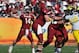 TAMPA, FL - JANUARY 01: Quarterback Connor Shaw #14 of the South Carolina Gamecocks sets to pass against the Michigan Wolverines in the Outback Bowl January 1, 2013 at Raymond James Stadium in Tampa, Florida. Carolina won 33 - 28. (Photo by Al Messerschmidt/Getty Images)