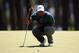 AUGUSTA, GA - APRIL 13: Tiger Woods of the United States lines up a putt on the third hole during the third round of the 2013 Masters Tournament at Augusta National Golf Club on April 13, 2013 in Augusta, Georgia. (Photo by Mike Ehrmann/Getty Images)