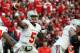 Nov 17, 2012; Madison, WI, USA; Ohio State quarterback Braxton Miller (5) throws a pass as his team plays the Wisconsin Badgers during the first half at Camp Randall Stadium. Mandatory Credit: Mary Langenfeld-USA TODAY Sports