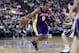 April 26, 2012; Sacramento, CA, USA; Los Angeles Lakers guard Andrew Goudelock (0) drives in against the Sacramento Kings during the second quarter at Power Balance Pavilion. Mandatory Credit: Kelley L Cox-USA TODAY Sports