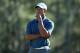 AUGUSTA, GA - APRIL 13: Tiger Woods of the United States stands on the 18th hole during the third round of the 2013 Masters Tournament at Augusta National Golf Club on April 13, 2013 in Augusta, Georgia. (Photo by Andrew Redington/Getty Images)
