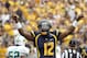PITTSBURGH, PA - SEPTEMBER 01: Geno Smith #12 of the West Virginia Mountaineers celebrates after a touchdown in the first half against the Marshall Thundering Herd during the game on September 1, 2012 at Mountaineer Field in Morgantown, West Virginia. (Photo by Justin K. Aller/Getty Images)