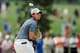 AUGUSTA, GA - APRIL 14: Rory McIlroy of Northern Ireland reacts after he hits a shot on the first hole during the final round of the 2013 Masters Tournament at Augusta National Golf Club on April 14, 2013 in Augusta, Georgia. (Photo by David Cannon/Getty Images)