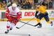 NASHVILLE, TN - APRIL 14: Valtteri Filppula #51 of the Detroit Red Wings skates against Nick Spaling #13 of the Nashville Predators at the Bridgestone Arena on April 14, 2013 in Nashville, Tennessee. (Photo by Frederick Breedon/Getty Images)