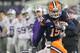 NEW YORK, NY - DECEMBER 30: Alec Lemon #15 of the Syracuse Orange is tackled by Emmanuel Lamur #23 of the Kansas State Wildcats during the New Era Pinstripe Bowl at Yankee Stadium on December 30, 2010 in New York, New York. (Photo by Chris McGrath/Getty Images)