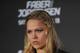 April 13, 2013; Las Vegas, NV, USA; Ronda Rousey poses for photographs following the TUF 17 Finale at the Mandalay Bay Events Center. Mandatory Credit: Gary A. Vasquez-USA TODAY Sports