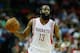 HOUSTON, TX - APRIL 12: James Harden #13 of the Houston Rockets brings the ball up court during the game against the Memphis Grizzlies at the Toyota Center on April 12, 2013 in Houston, Texas. NOTE TO USER: User expressly acknowledges and agrees that, by downloading and or using this photograph, User is consenting to the terms and conditions of the Getty Images License Agreement. (Photo by Scott Halleran/Getty Images)
