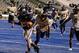 Dec 15,2012; Boise,ID, USA; Utah State Aggies running back Kerwynn Williams (25) scores his third touch down of the second half of the Famous Idaho Potato Bowl against the Toledo Rockets at Bronco Stadium. Utah State defeated Toledo 41-15. Mandatory Credit: Brian Losness-USA TODAY Sports