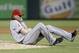 ARLINGTON, TX - APRIL 7: Starting pitcher Jered Weaver #36 of the Los Angeles Angels of Anaheim grabs his left elbow after falling awkwardly to avoid a line drive in the sixth inning of a baseball game against the Texas Rangers at Rangers Ballpark in Arlington on April 7, 2013 in Arlington, Texas. Texas won 7-3. (Photo by Brandon Wade/Getty Images)