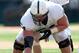 Sep 29, 2012; Champaign, IL, USA; Penn State Nittany Lions quarterback Matthew McGloin (11) prepares to take a snap from center Matt Stankiewitch (54) during the game against the Illinois Fighting Illini at Memorial Stadium. Mandatory Credit: Bradley Leeb-USA TODAY Sports