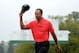 AUGUSTA, GA - APRIL 14: Tiger Woods of the United States waves to the patrons after the 18th hole during the final round of the 2013 Masters Tournament at Augusta National Golf Club on April 14, 2013 in Augusta, Georgia. (Photo by Harry How/Getty Images)