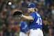 TORONTO, CANADA - APRIL 7: R.A. Dickey #43 of the Toronto Blue Jays gets the ball back after surrendering a hit during MLB game action against the Boston Red Sox on April 7, 2013 at Rogers Centre in Toronto, Ontario, Canada. (Photo by Tom Szczerbowski/Getty Images)