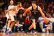 NEW YORK, NY - DECEMBER 19: Brook Lopez #11 of the Brooklyn Nets dribbles against Tyson Chandler #6 of the New York Knicks during their game at Madison Square Garden on December 19, 2012 in New York City. NOTE TO USER: User expressly acknowledges and agrees that, by downloading and or using this photograph, User is consenting to the terms and conditions of the Getty Images License Agreement. (Photo by Al Bello/Getty Images)