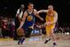 Stephen Curry drives to the bucket on the Lakers' Steve Blake