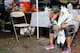 BOSTON, MA - APRIL 15: A runner sits near Kenmore Square after two bombs exploded during the 117th Boston Marathon on April 15, 2013 in Boston, Massachusetts. Two people are confirmed dead and at least 23 injured after two explosions went off near the finish line to the marathon. (Photo by Alex Trautwig/Getty Images)
