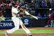 ATLANTA, GA - APRIL 6: Justin Upton #8 of the Atlanta Braves hits a ninth inning with a game-winning home run against the Chicago Cubs at Turner Field on April 6, 2013 in Atlanta, Georgia. (Photo by Scott Cunningham/Getty Images)