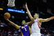 HOUSTON, TX - JANUARY 08: Darius Morris #1 of the Los Angeles Lakers takes a shot over Jeremy Lin #7 of the Houston Rockets at Toyota Center on January 8, 2013 in Houston, Texas. NOTE TO USER: User expressly acknowledges and agrees that, by downloading and or using this photograph, User is consenting to the terms and conditions of the Getty Images License Agreement. (Photo by Scott Halleran/Getty Images)