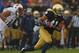 SOUTH BEND, IN - OCTOBER 13: Matthias Farley #41 of the Notre Dame Fighting Irish breaks away from Levine Toilolo#11 of the Standford Cardinal after intercepting a pass at Notre Dame Stadium on October 13, 2012 in South Bend, Indiana. Notre Dame defeated Stanford 20-13 in overtime. (Photo by Jonathan Daniel/Getty Images)