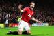 MANCHESTER, ENGLAND - NOVEMBER 28: Robin van Persie of Manchester United celebrates as he scores their first goal during the Barclays Premier League match between Manchester United and West Ham United at Old Trafford on November 28, 2012 in Manchester, England. (Photo by Clive Brunskill/Getty Images)