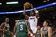 MIAMI, FL - NOVEMBER 21: Dwyane Wade #3 of the Miami Heat shoots over Ersan Ilyasova #7 of the Milwaukee Bucks during a game at AmericanAirlines Arena on November 21, 2012 in Miami, Florida. (Photo by Mike Ehrmann/Getty Images)
