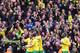 LONDON, ENGLAND - APRIL 13: Michael Turner of Norwich City celebrates scoring the first goal of the match with teammates during the Barclays Premier League match between Arsenal and Norwich City at Emirates Stadium on April 13, 2013 in London, England. (Photo by Mike Hewitt/Getty Images)