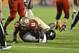 Jan 1, 2013; Miami Gardens, FL, USA; Florida State Seminoles linebacker Vince Williams (11) sacks Northern Illinois Huskies quarterback Jordan Lynch (6) in the fourth quarter of the game at the 2013 Orange Bowl at Sun Life Stadium. The Seminoles defeated the Huskies 31-10. Mandatory Credit: Ron Chenoy-USA TODAY Sports