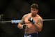 May 26, 2012; Las Vegas, NV, USA; Frank Mir prepares to throw a punch against Junior Dos Santos (not pictured) during UFC 146 at the MGM Grand Garden event center. Mandatory Credit: Ron Chenoy-USA TODAY Sports