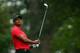 AUGUSTA, GA - APRIL 14: Tiger Woods of the United States tees off on the fourth hole during the final round of the 2013 Masters Tournament at Augusta National Golf Club on April 14, 2013 in Augusta, Georgia. (Photo by Mike Ehrmann/Getty Images)