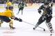 SHAWINIGAN, CANADA - MAY 27: Max Domi #16 of the London Knights stick handles the puck past Jonathan Racine #3 of the Shawinigan Cataractes during the 2012 MasterCard Memorial Cup game at the Bionest Centre on May 27, 2012 in Shawinigan, Quebec, Canada. (Photo by Richard Wolowicz/Getty Images)