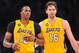 April 5, 2013; Los Angeles, CA, USA; Los Angeles Lakers center Dwight Howard (12) speaks with power forward Pau Gasol (16) during a stoppage in play against the Memphis Grizzlies in the second half at Staples Center. Mandatory Credit: Gary A. Vasquez-USA TODAY Sports